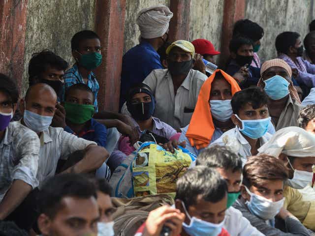 Millions of migrant workers in India (pictured) have been left destitute by the country's coronavirus lockdown