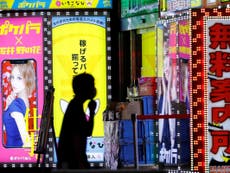 ‘Kiss only your partner’: Japan suggests new Covid nightlife rules