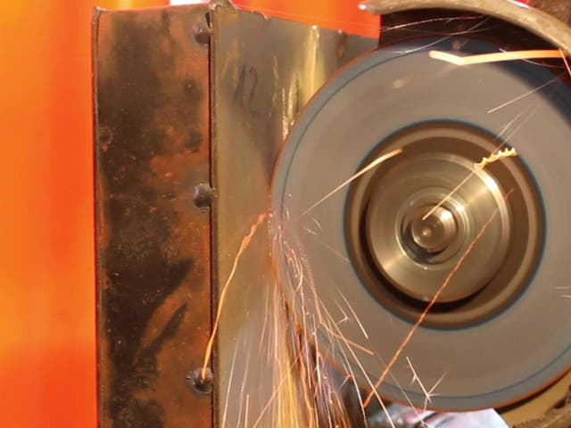 Footage shows an angle grinder attack on the Proteus material