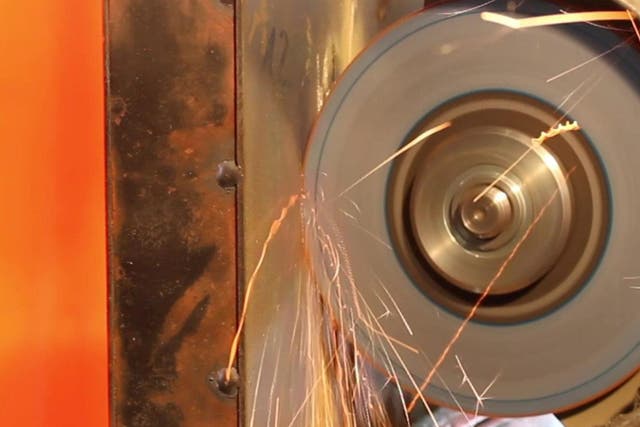 Footage shows an angle grinder attack on the Proteus material