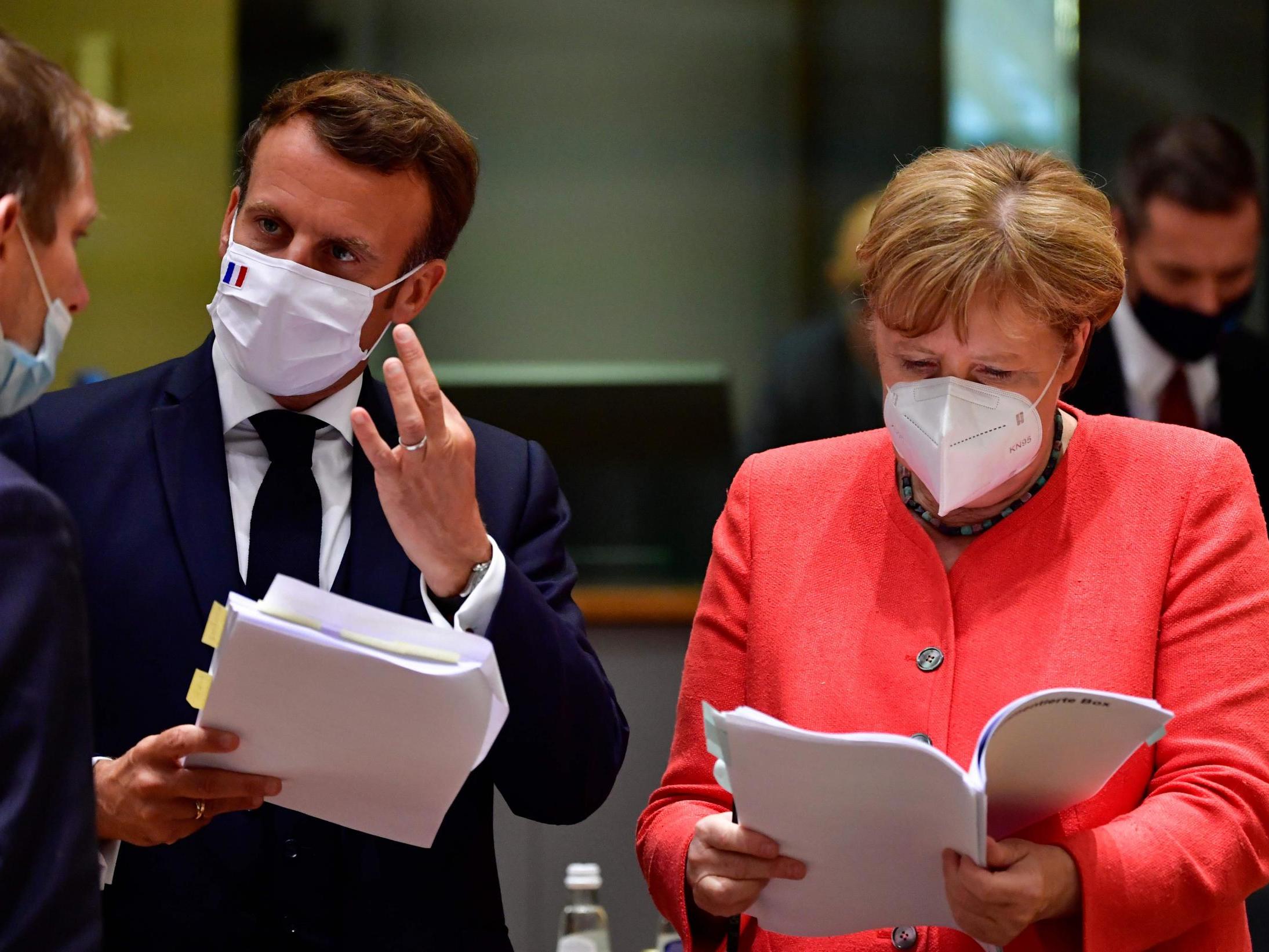 Emmanuel Macron and Angela Merkel kept hopes of a deal alive, a diplomat said