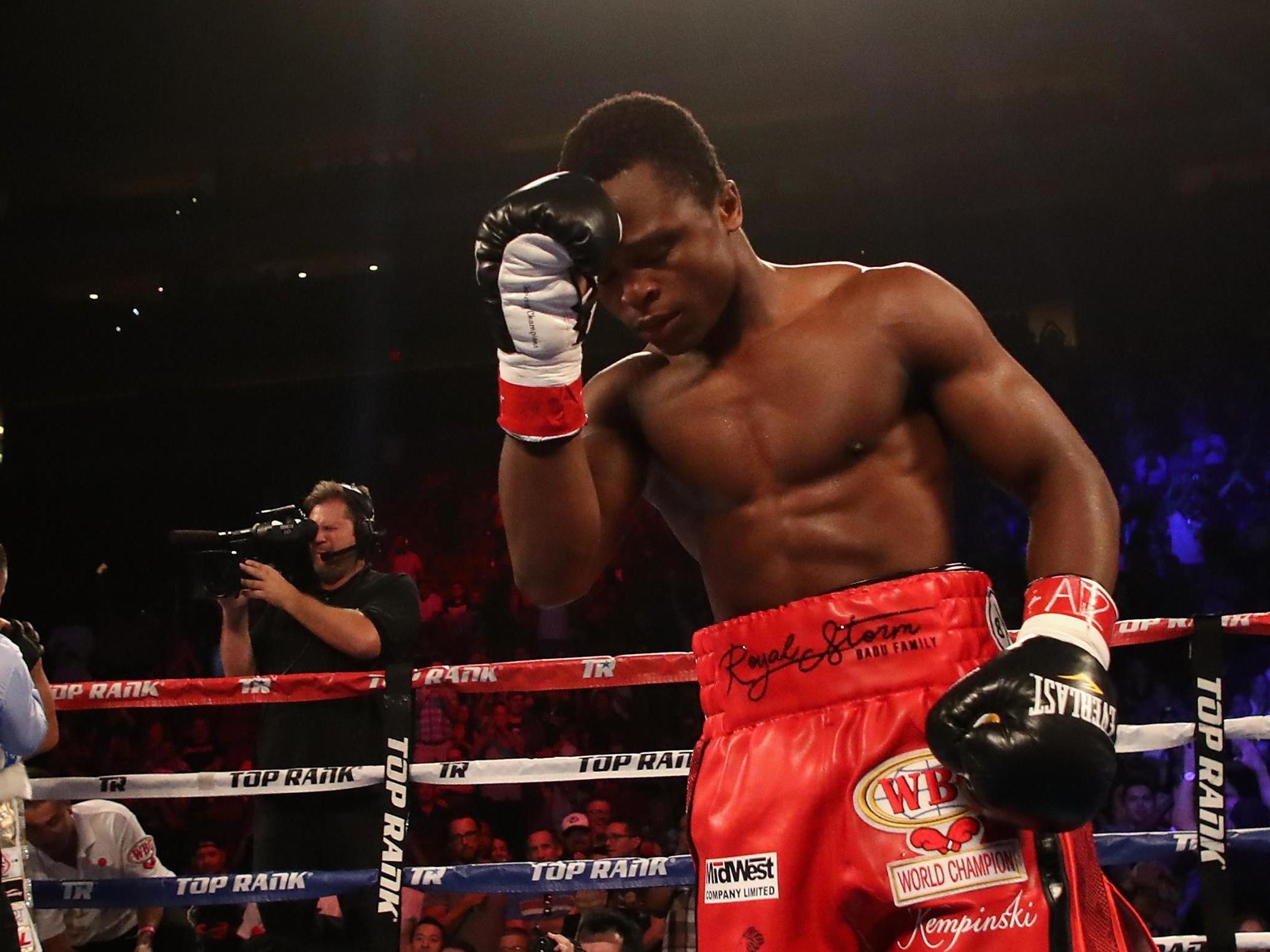 Isaac Dogboe celebrates defending his WBO world title against Hidenori Otaki in 2018