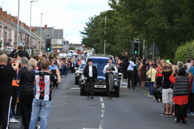Well wishers line the streets to pay their respects to Big Jack