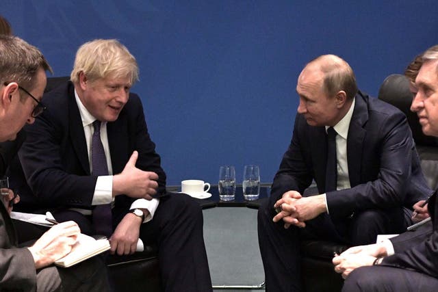 Boris Johnson and Vladimir Putin at the International Libya Conference in Germany