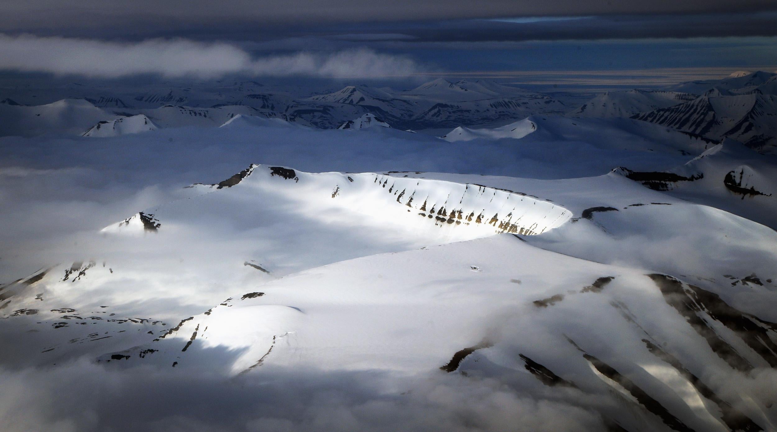 Snowy peaks in Longyearbyen where Misha has taken up residence nearby (Getty)