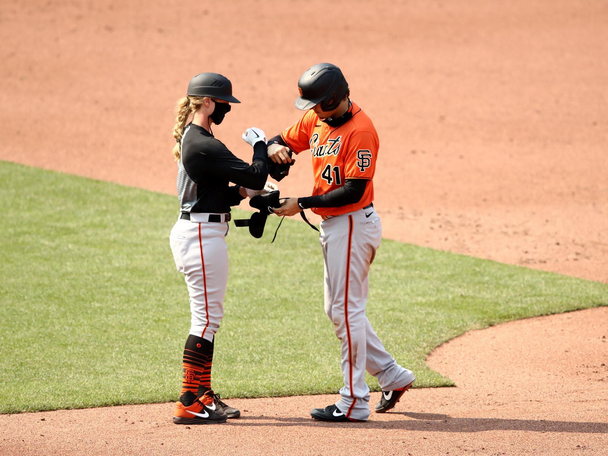 San Francisco Giants' Alyssa Nakken becomes first woman to coach on-field  in MLB, The Independent