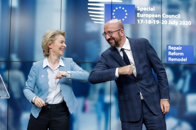 Something to celebrate at last: European Commission president Ursula Von Der Leyen  and European Council president Charles Michel