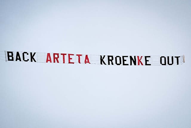A banner reading 'Back Arteta Kroenke Out' appeared above Arsenal's defeat by Aston Villa