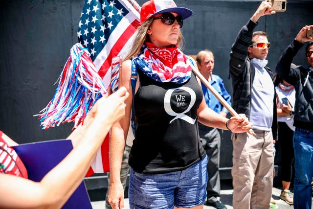 A QAnon supporter at an anti-lockdown rally in California