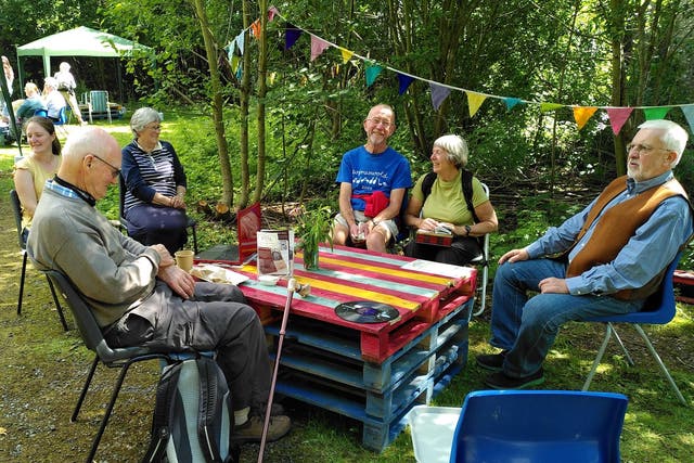A socially-distanced meet up in the garden of Settle theatre in North Yorkshire, where the community hub is using Twine to track attendance at events