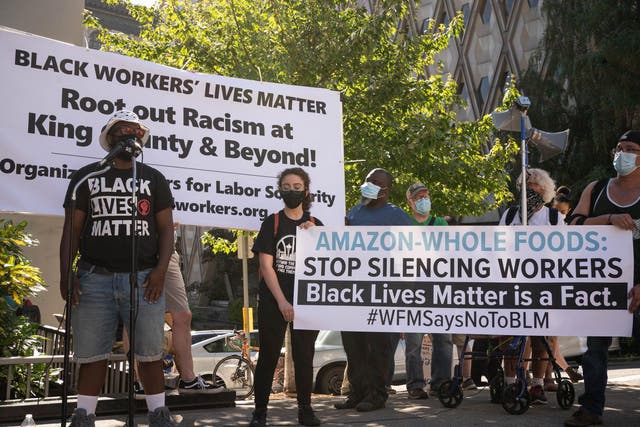 Workers from a local Whole Foods store speak during a picket and rally event outside the office of King County Executive Dow Constantine as part of the nationwide Strike For Black Lives on 20 July 2020 in Seattle