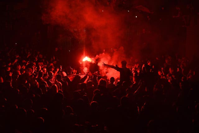 Liverpool fans defied police orders to celebrate outside Anfield