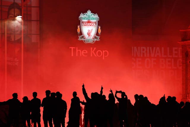Liverpool supporters defied police orders to celebrate the club's Premier League success
