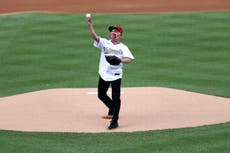 Dr Fauci throws out ceremonial first pitch to open baseball season