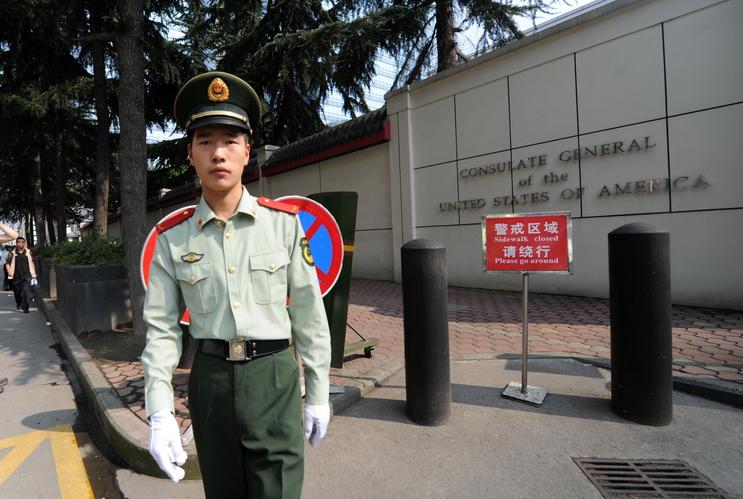 File: a Chinese paramilitary policeman stands guard at the entrance of the US consulate in Chengdu. China says it has revoked the licence for the consulate in retaliation for the closure of China's Houston consulate earlier this week