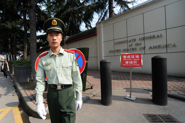 File: a Chinese paramilitary policeman stands guard at the entrance of the US consulate in Chengdu. China says it has revoked the licence for the consulate in retaliation for the closure of China's Houston consulate earlier this week