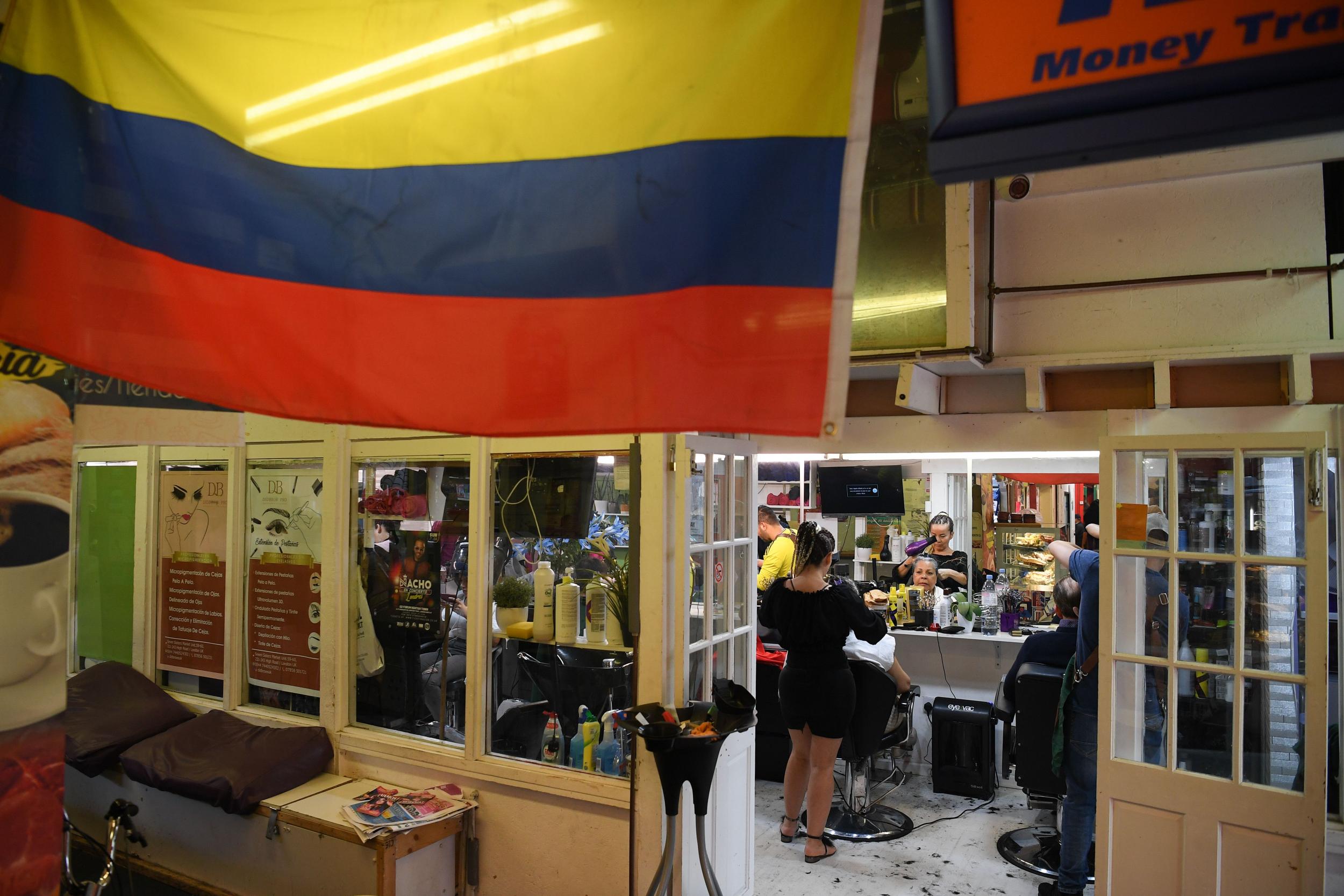 &apos;We&apos;re far from home, but here we have a little corner to ourselves&apos;: Latin Village protesters call for market to be reopened thumbnail
