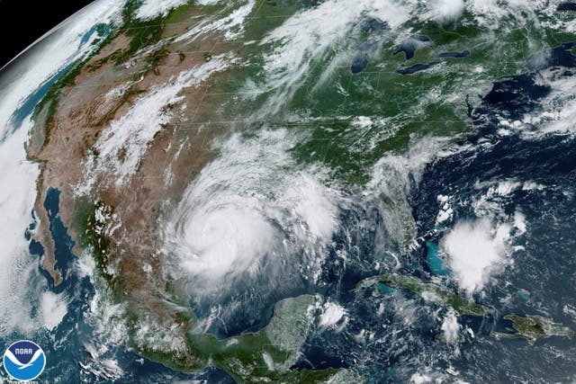 A satellite image shows Hurricane Hanna in the Gulf of Mexico and approaching the coast of Texas