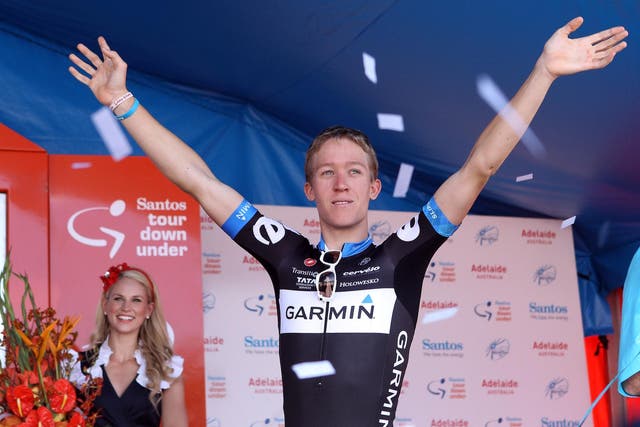 Cameron Meyer of Australia and Team Garmin-Cervelo celebrates on the podium as race winner after Stage Six of the 2011 Tour Down Under on January 23, 2011 in Adelaide, Australia