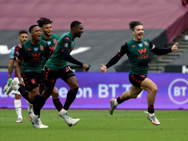 Jack Grealish celebrates after scoring for Aston Villa