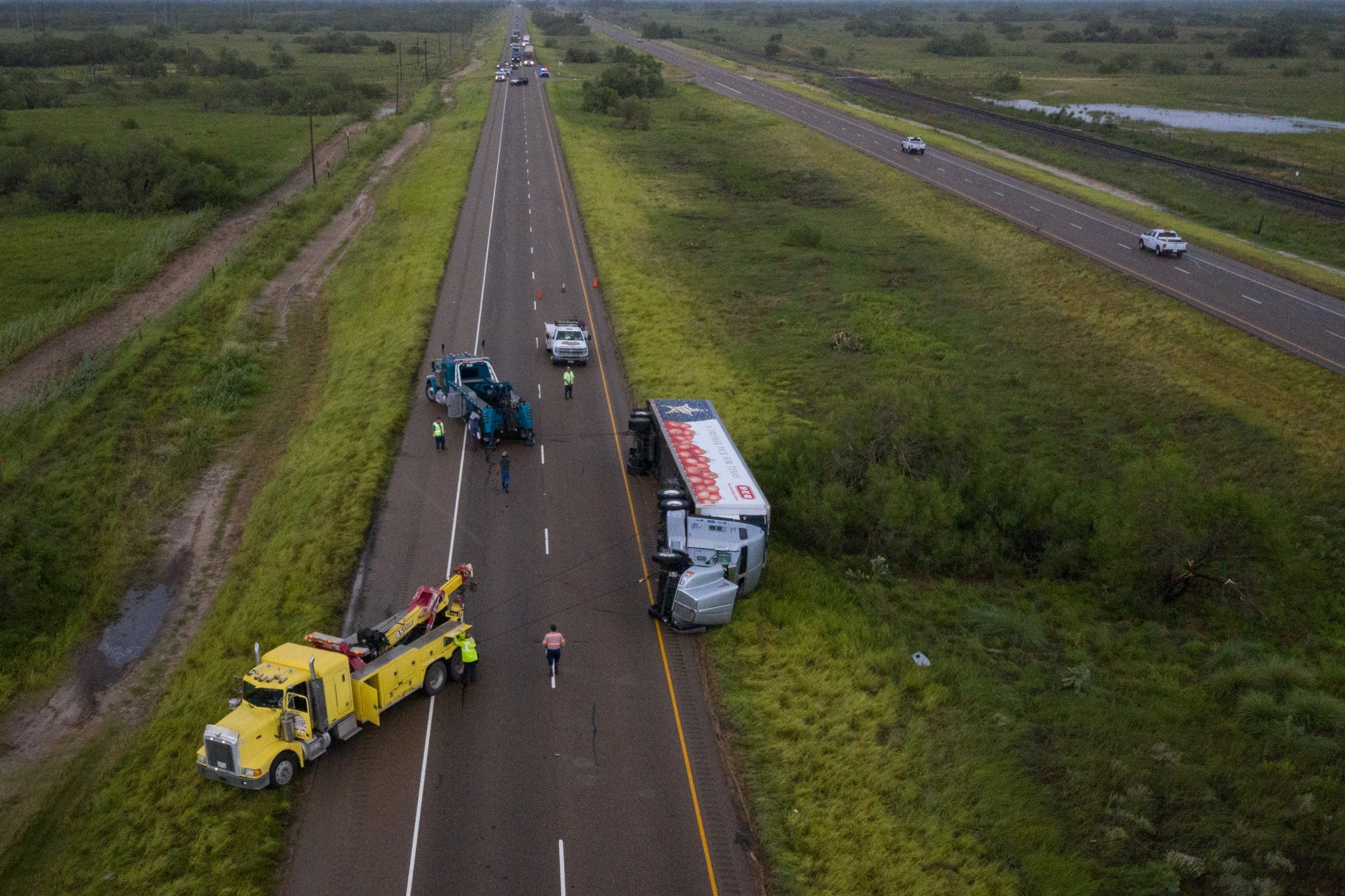 An overturned truck on US Route 77 in Sarita, Texas which was blown over by high winds brought by Tropical Storm Hanna