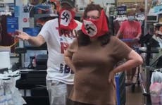 Couple wearing swastika face masks insist they aren't Nazis 