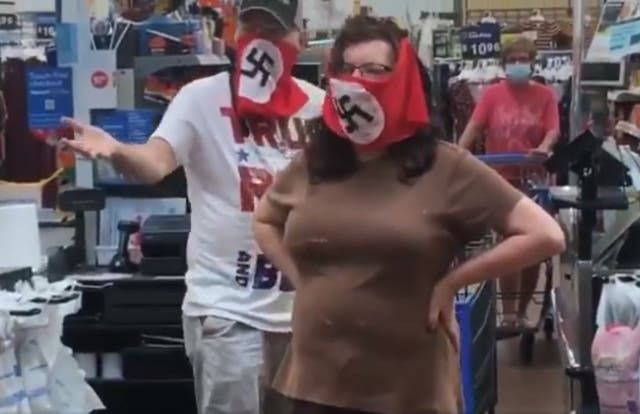 A couple wearing swastika masks inside a Walmart in Marshall, Minnesota