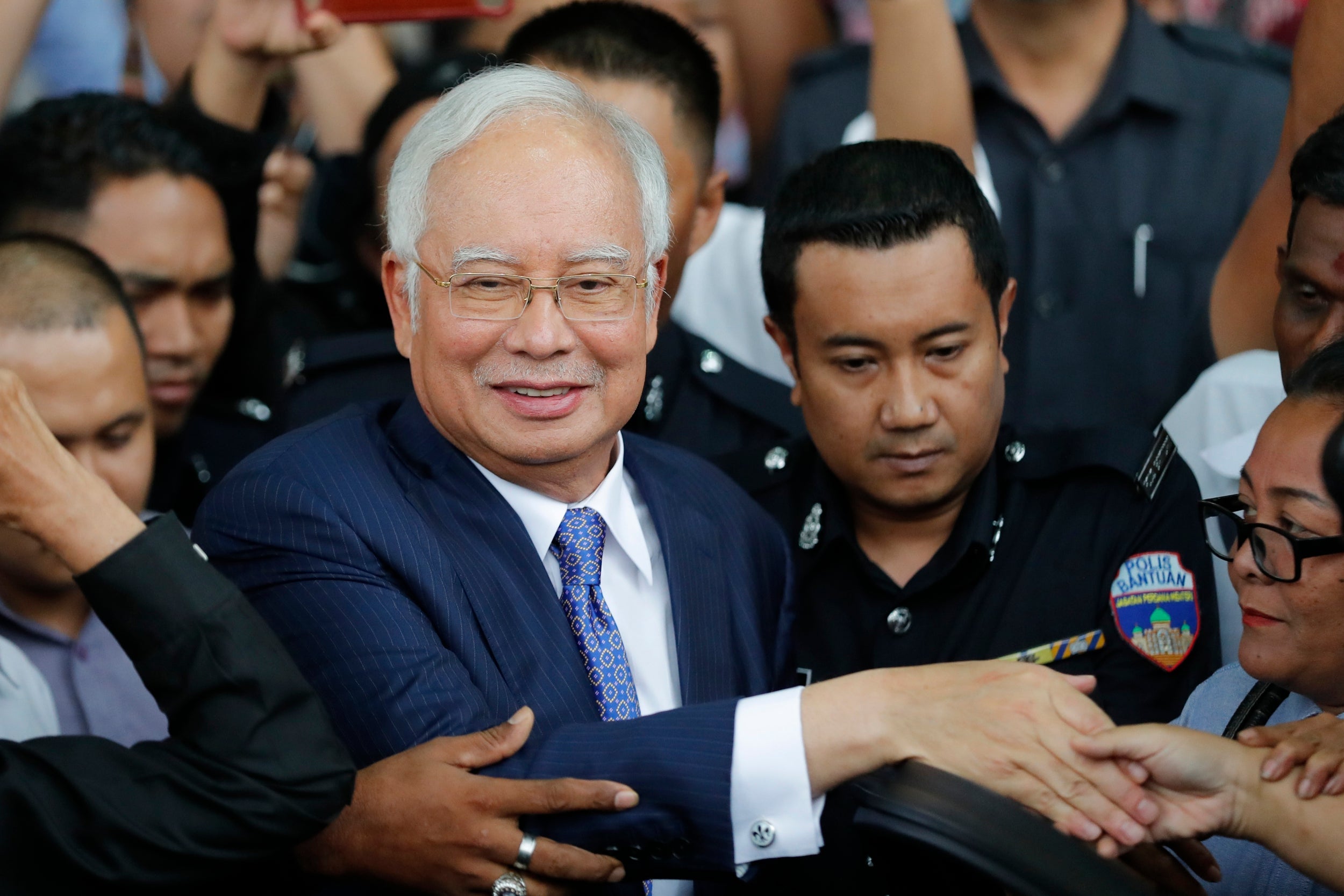 Former Malaysian prime minister Najib Razak is seen after an April court appearance at the Kuala Lumpur High Court. Najib has been found guilty in the first of five corruption trials linked to one of the world's biggest financial scandals