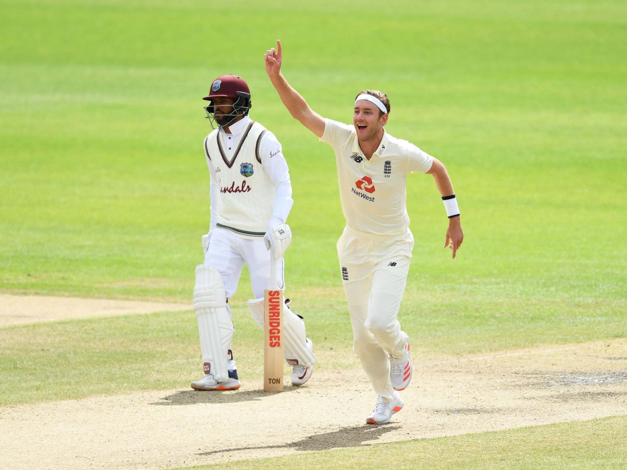 Stuart Broad celebrates taking his 500th Test wicket