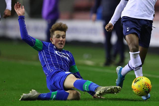 Alfie Devine, 15, in action against his new club Tottenham
