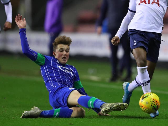 Alfie Devine, 15, in action against his new club Tottenham