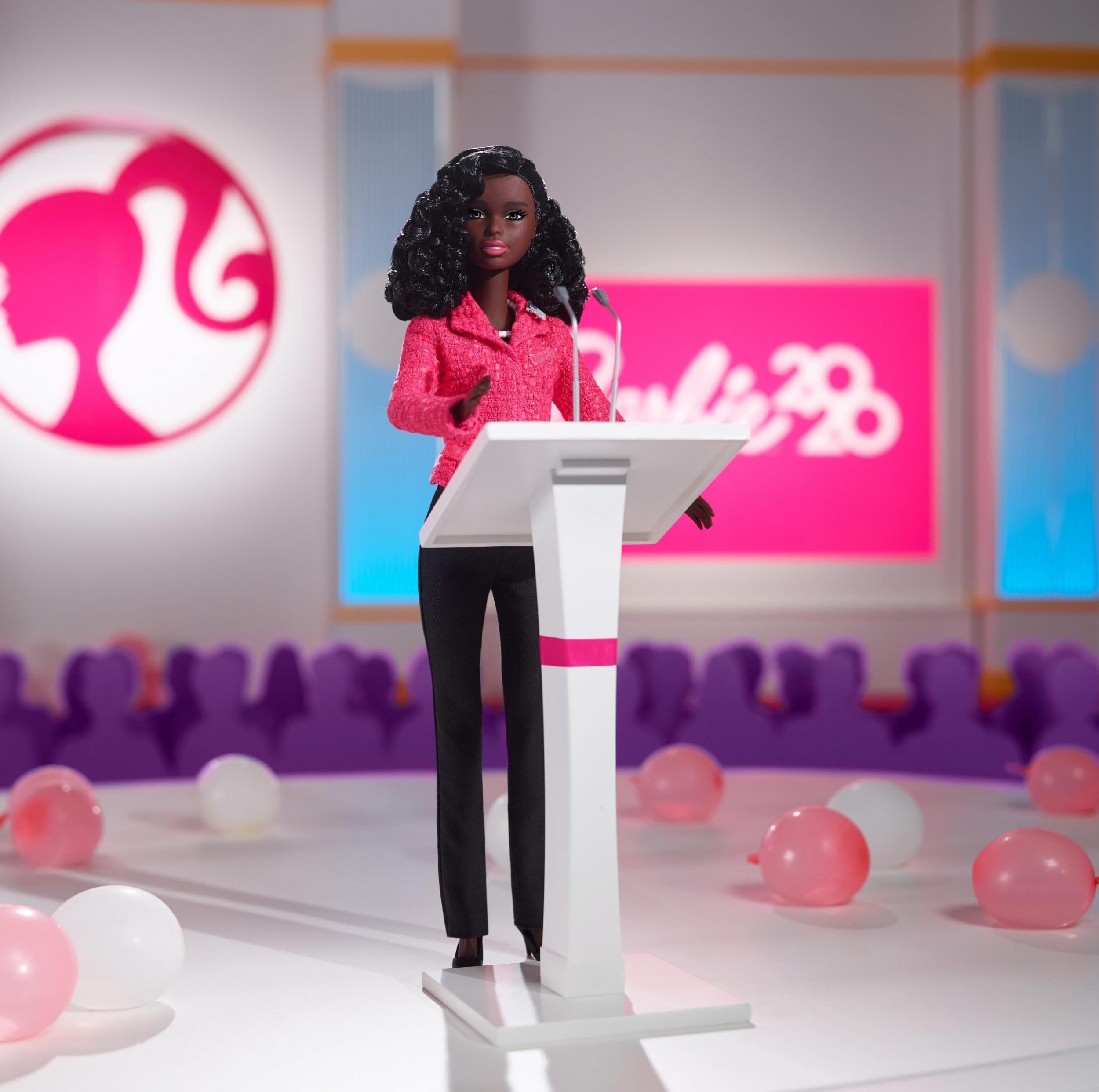 New doll set includes a black female presidential candidate dressed in a pink blazer (Mattel)
