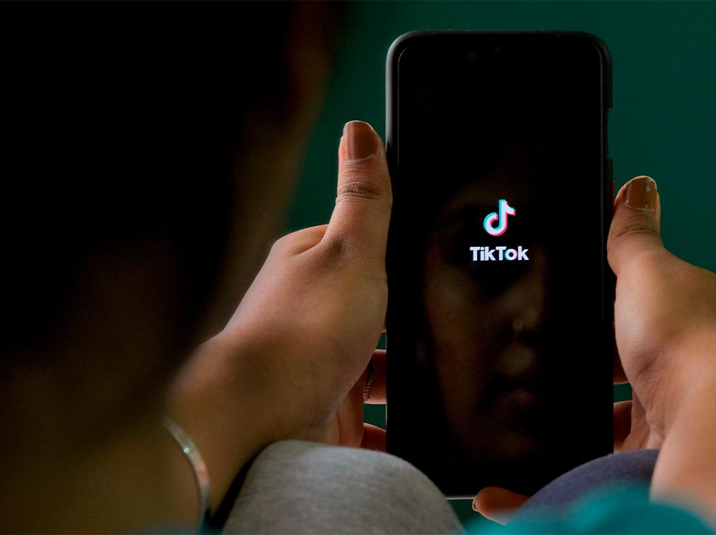 TikTok is owned by a Chinese company. MANJUNATH KIRAN, AFP via Getty Images