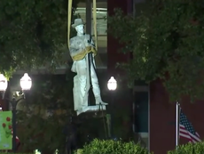 Protester arrested as Confederate statue removed in Georgia