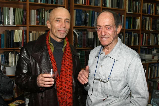 Fusco (right) with fellow photographer Walter Martin in 2008