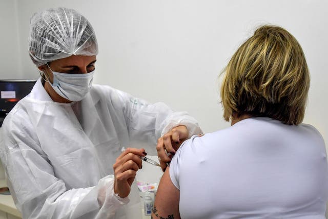 Vaccine trials have been taking place all over the world, as seen here in Sao Paulo, Brazil where pediatric doctor Monica Levi becomes one of 5,000 volunteers to participate in phase 3 of Brazil's