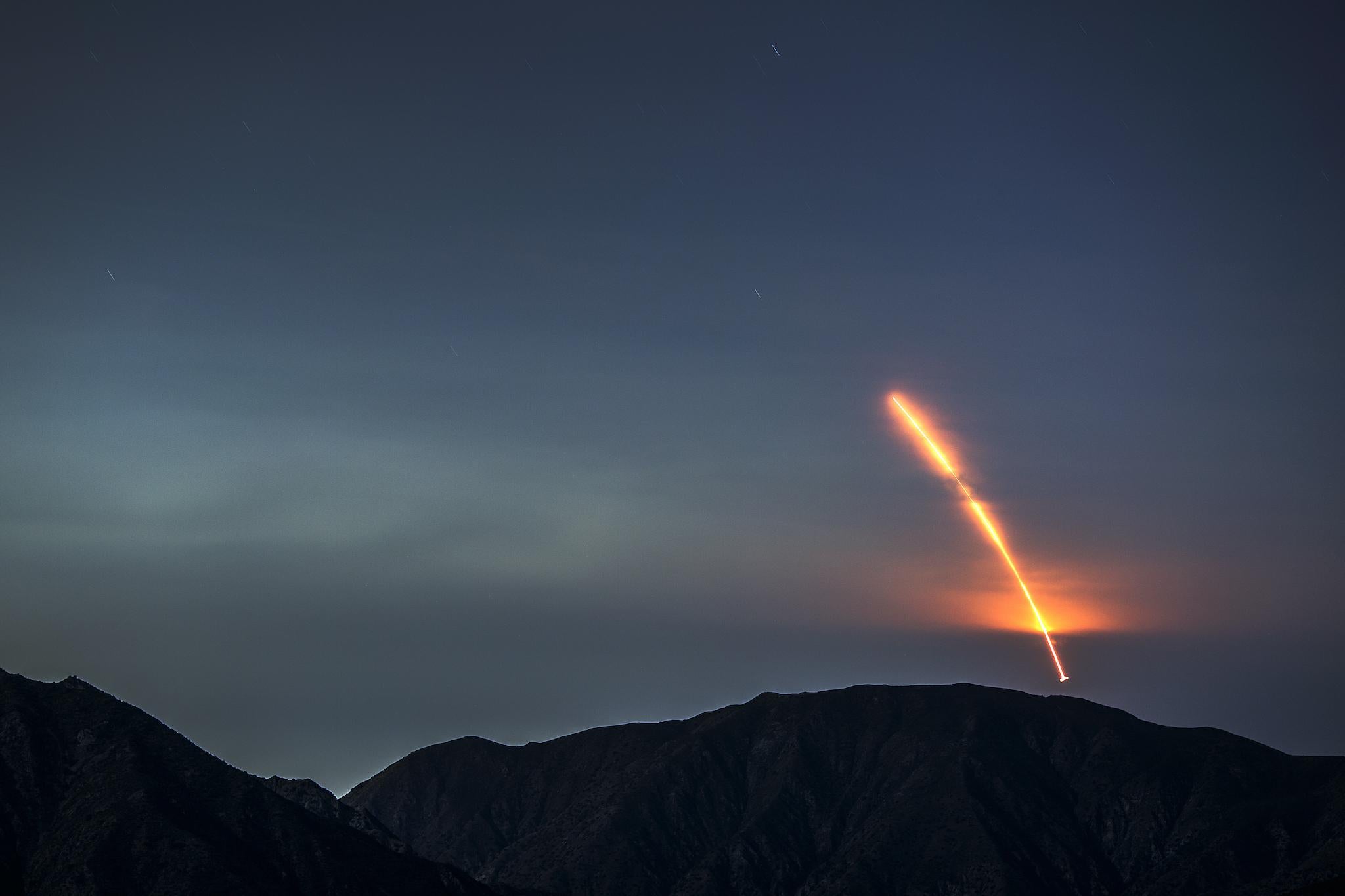 The Atlas 5 rocket carrying the Mars InSight probe launches from Vandenberg Air Force Base, as seen from the San Gabriel Mountains more than 100 miles away, on May 5, 2018 near Los Angeles, California