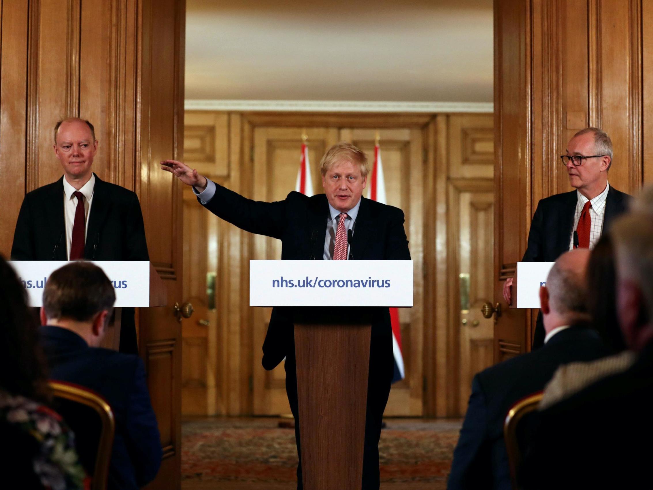 Boris Johnson alongside chief medical officer Chris Whitty (left) and chief scientific adviser Sir Patrick Vallance