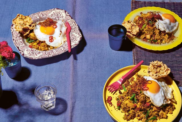 Add some luxury to this Indonesian classic with a runny duck egg