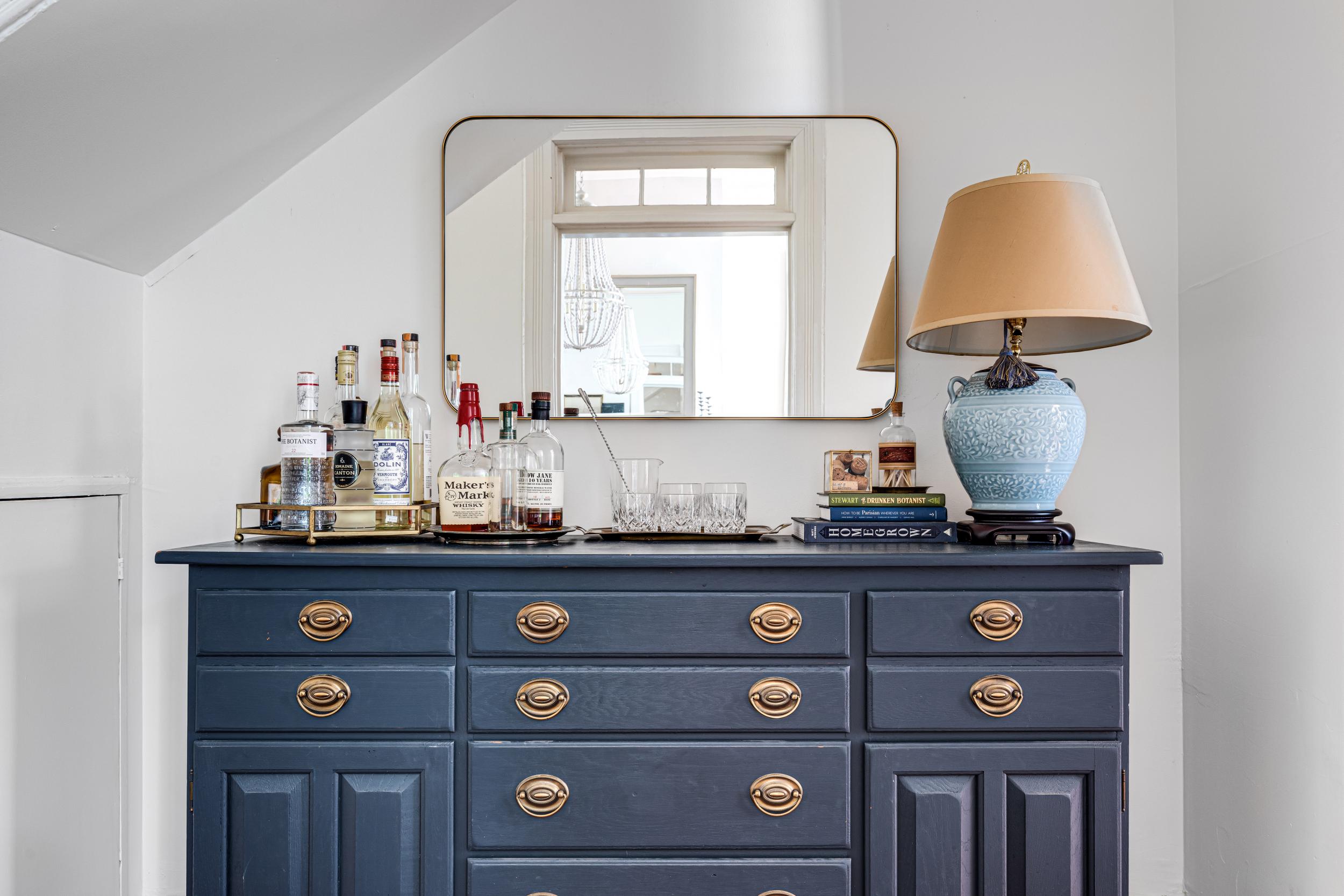 Left with a surplus of sideboards, McFadden breathed new life into this one with a fresh coat of paint