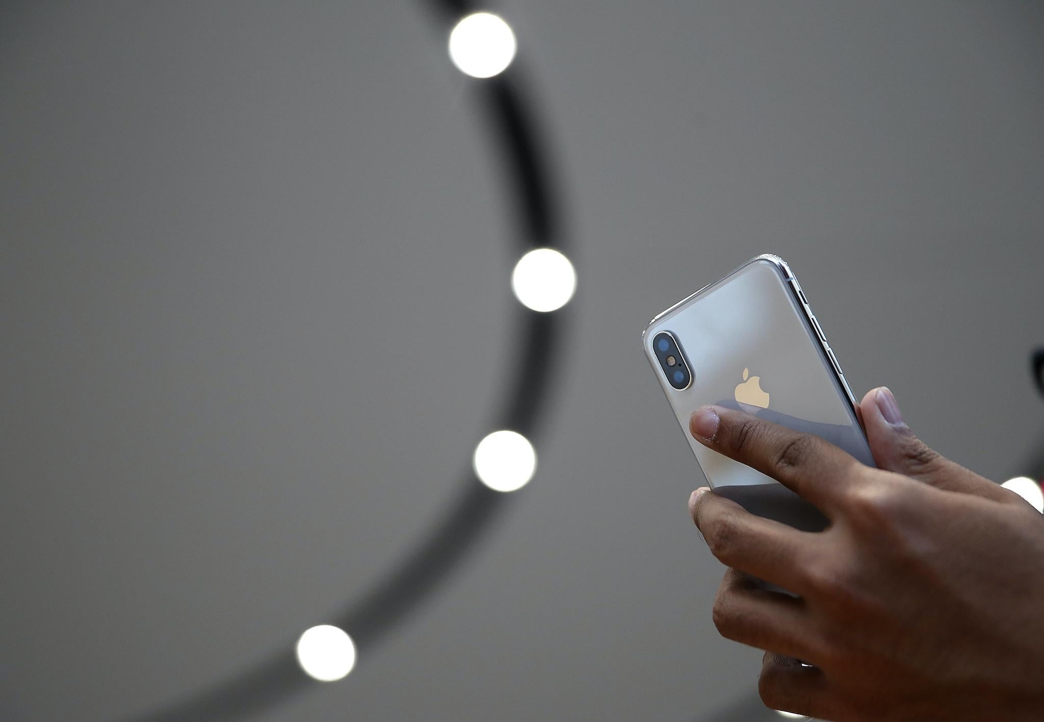 Apple CEO Tim Cook speaks during an Apple special event at the Steve Jobs Theatre on the Apple Park campus on September 12, 2017 in Cupertino, California