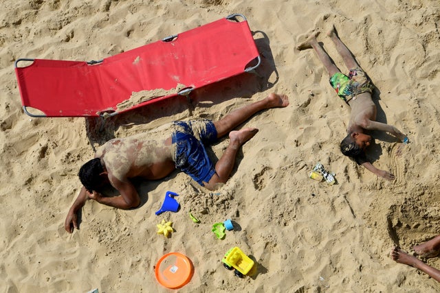 People enjoy the sunny weather at a Bournemouth Beach