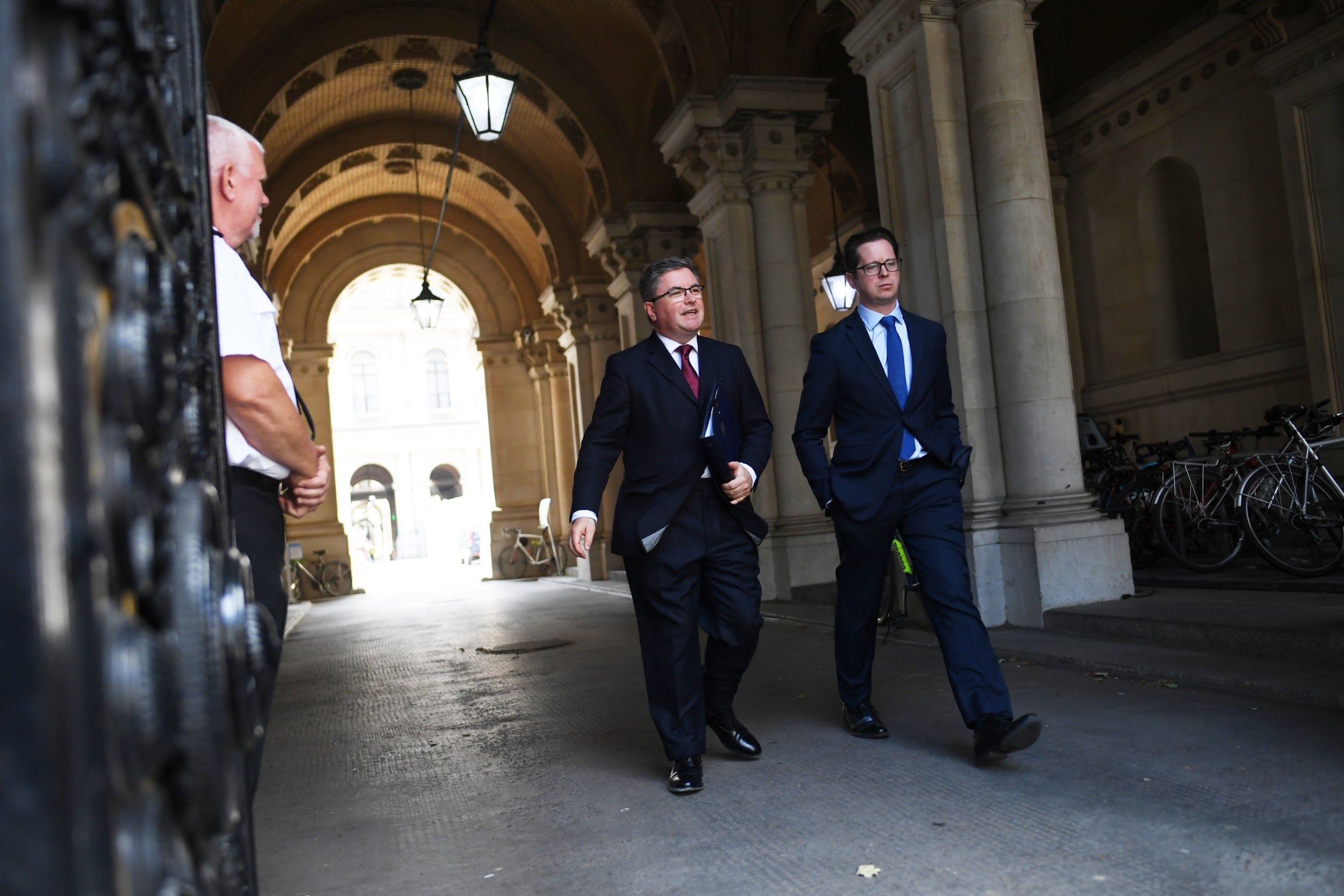 Robert Buckland, the secretary of state for justice (left)