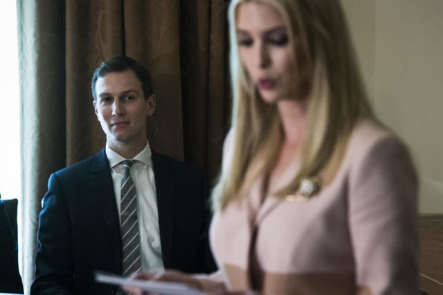 Jared Kushner listens as Ivanka Trump speaks during a cabinet meeting at the White House on 18 July