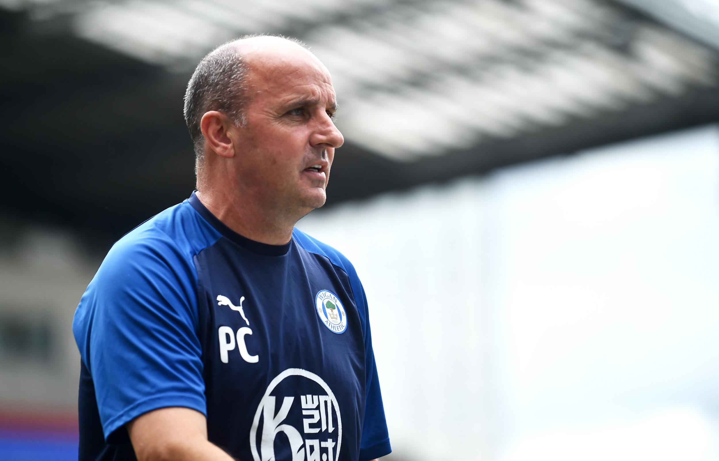 Paul Cook leaves Wigan