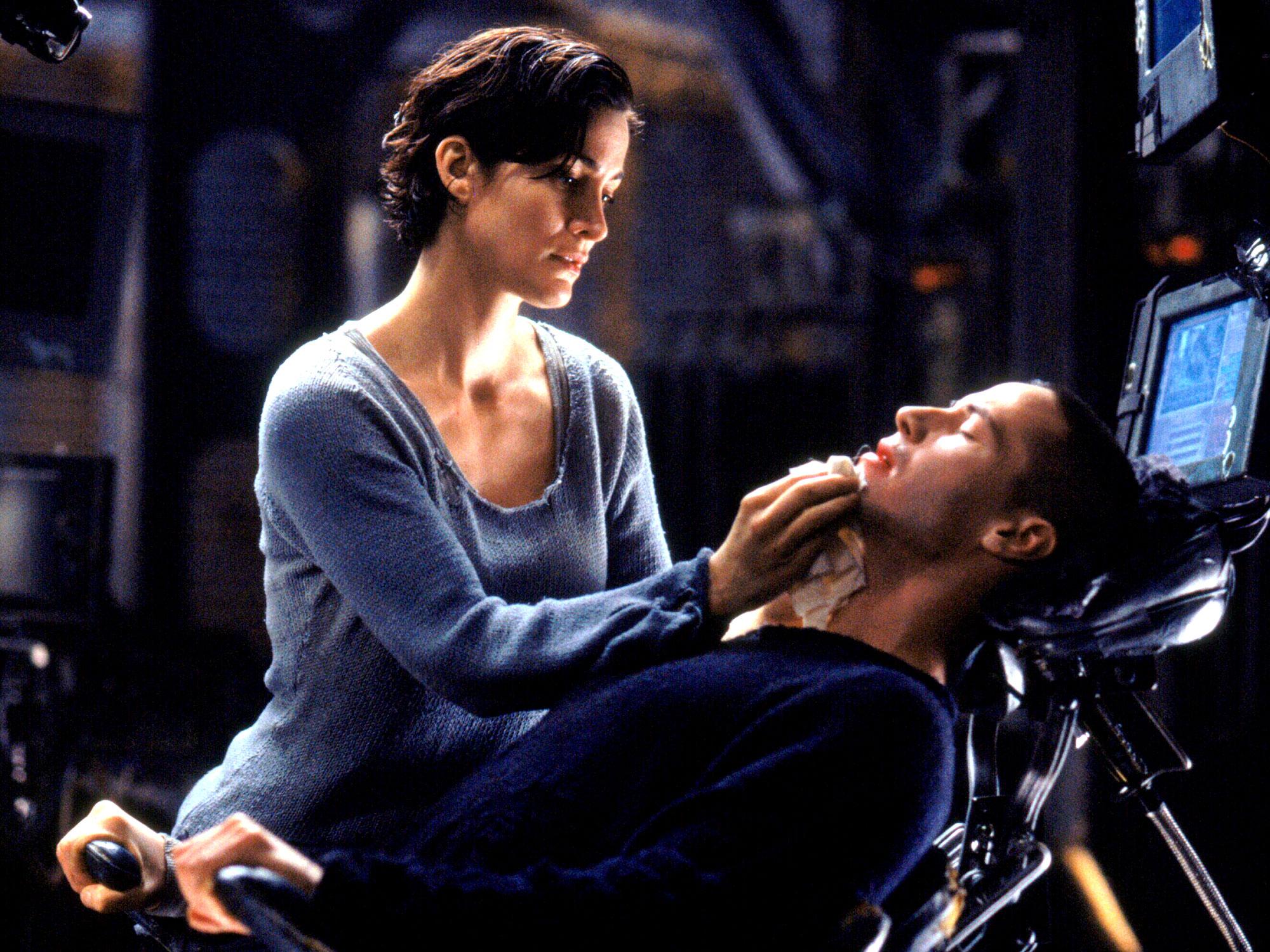 Carrie-Anne Moss and Keanu Reeves in ‘The Matrix’ (Warner Bros)