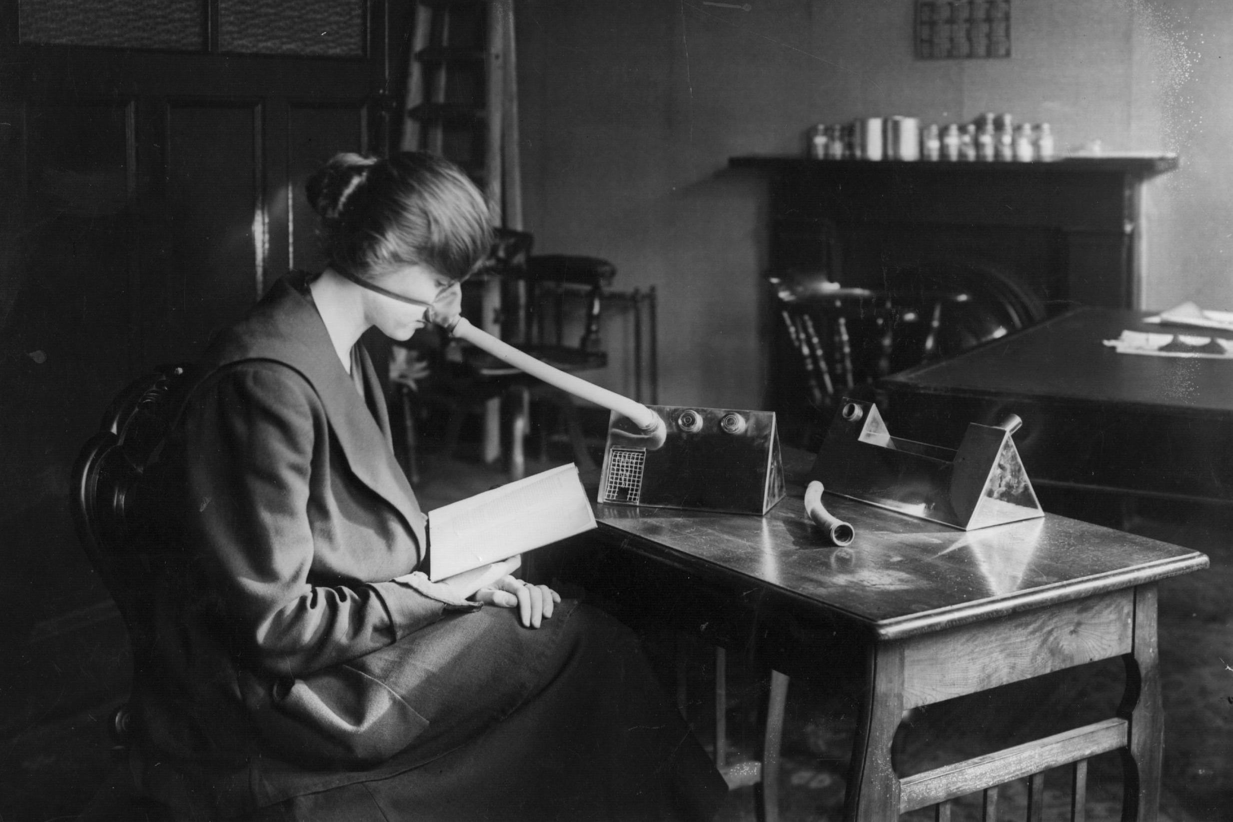 A woman wears a flu mask during the epidemic that followed the First World War (Getty)