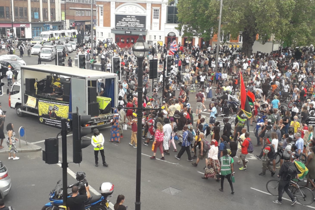 Crowds gather for anti-racism demonstration in Brixton
