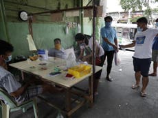 Philippines coronavirus cases top 100,000 in ‘losing battle’