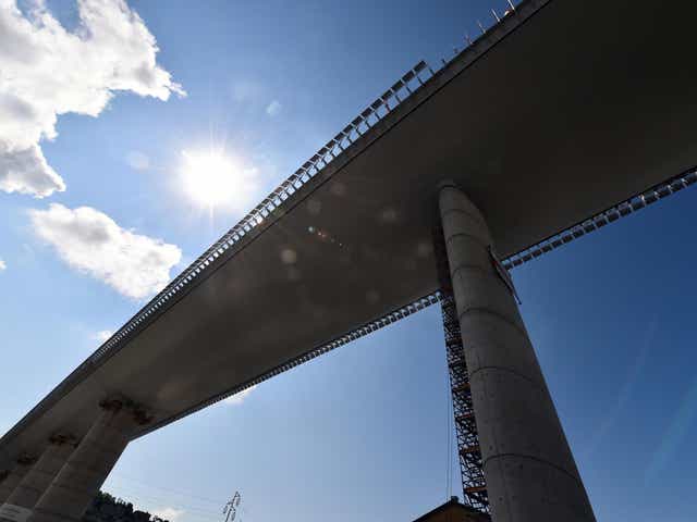 A general view shows the Genoa bridge as engineers perform static testing operations ahead of its inauguration in Genoa